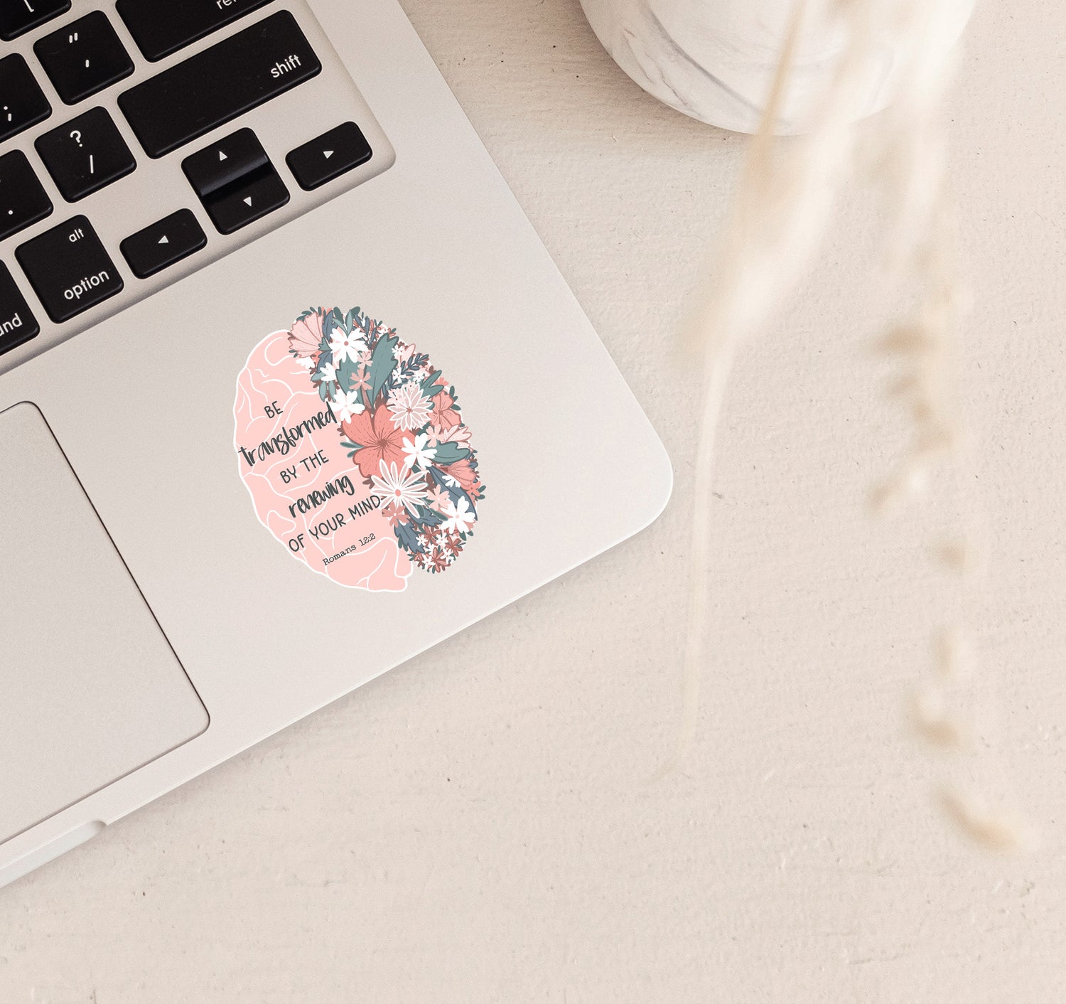 Be Transformed by the Renewing of Your Mind, Romans 12:2 Christian brain sticker with flowers on a laptop