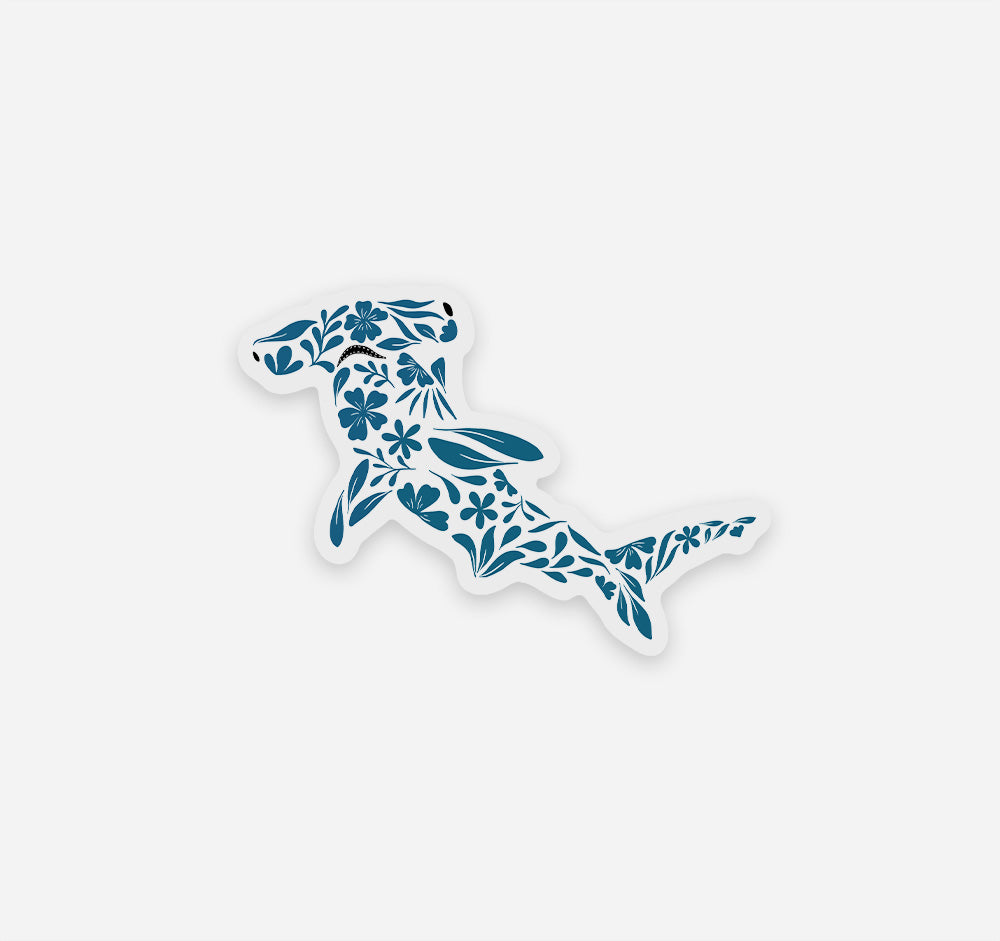Hammerhead shark sticker created with turquoise flowers and leaves pattern