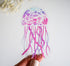 Pink and purple jellyfish sticker with flowers