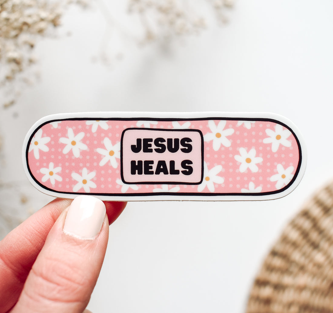 Jesus heals vinyl sticker on a band aid design