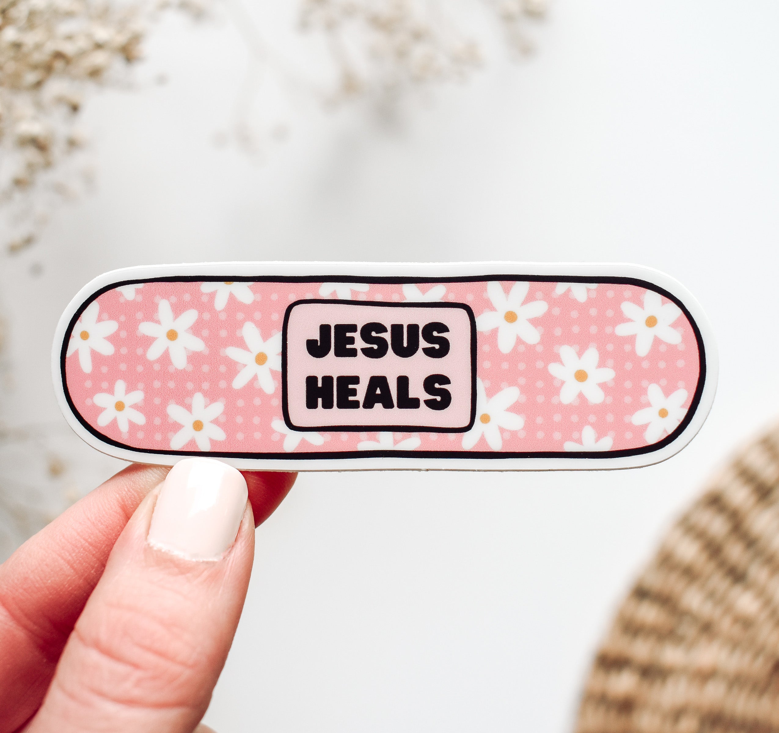 Jesus heals vinyl sticker on a band aid design