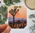 Joshua Tree National Park sticker with yucca tree, cactus, and mountains