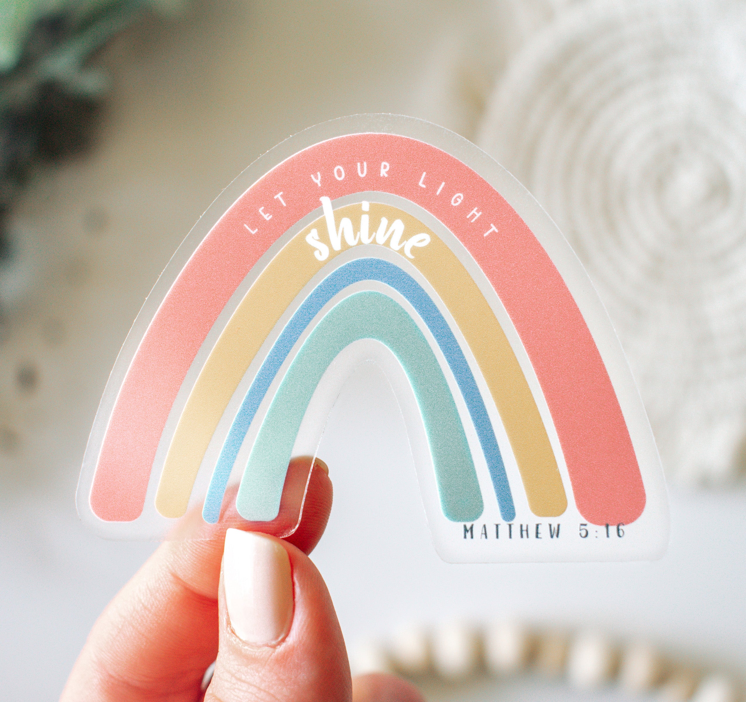 Rainbow sticker with the Matthew 5:16 Bible verse let your light shine
