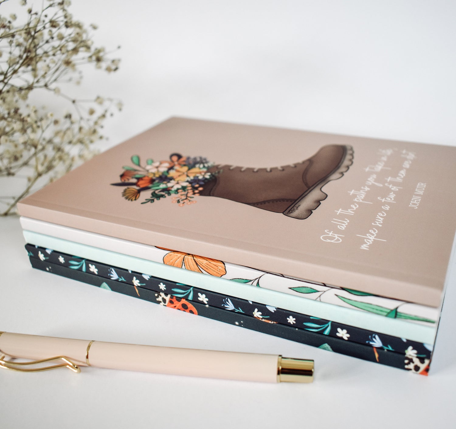 Stack of notebooks by Wild Peonies Studio