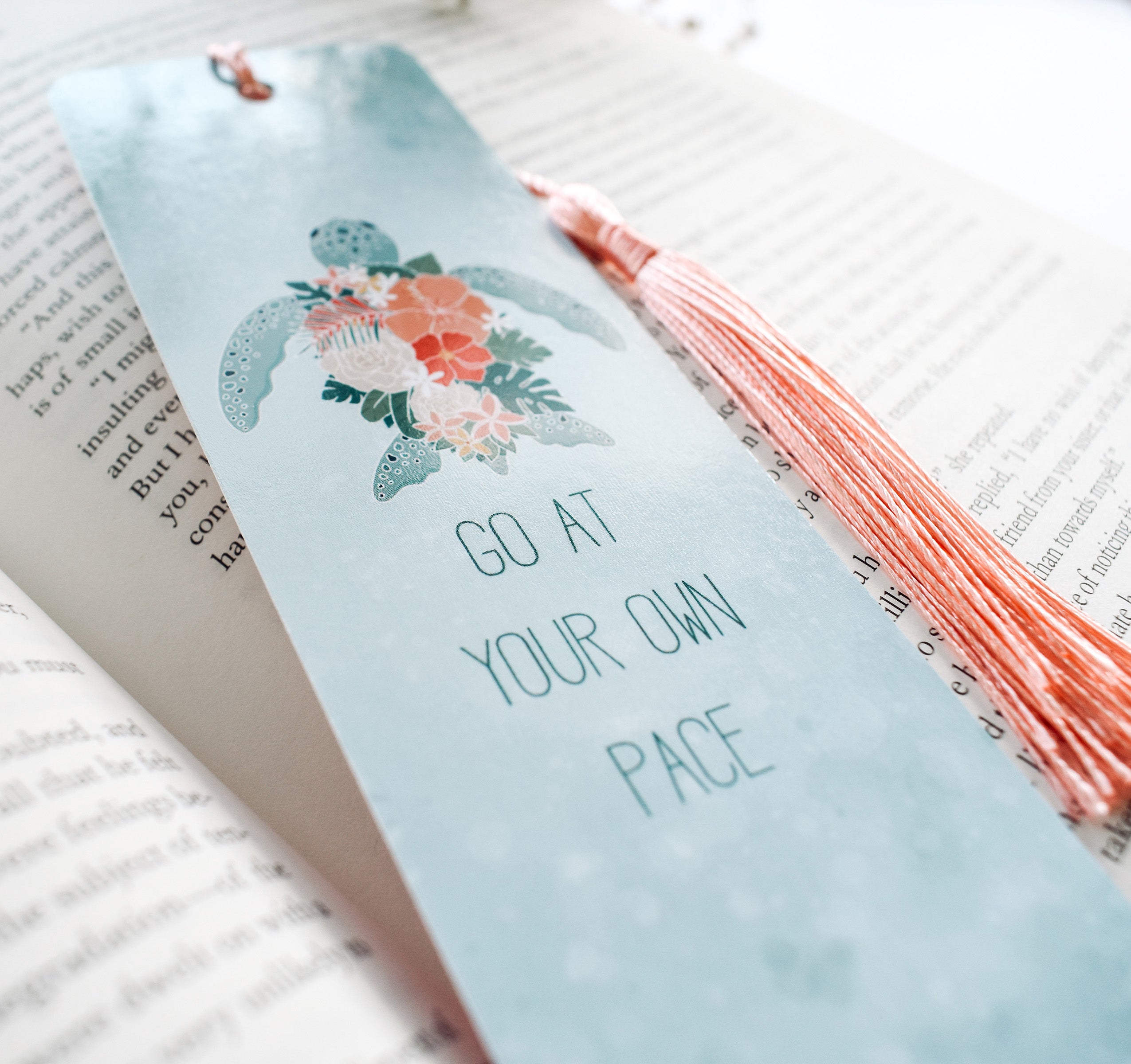 Hawaiian green sea turtle with tropical flowers bookmark and the quote "go at your own pace"