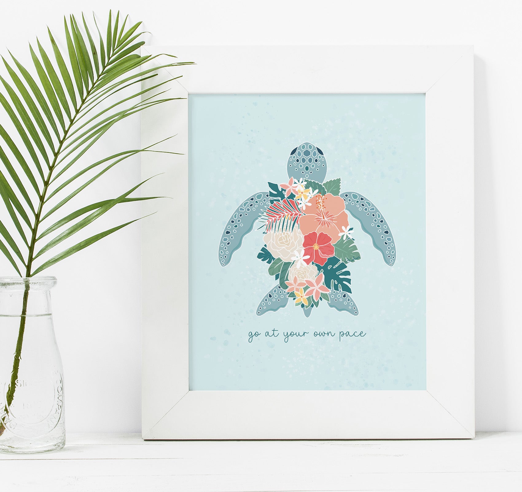 Turquoise sea turtle art print with pink flowers and the quote "go at your own pace"
