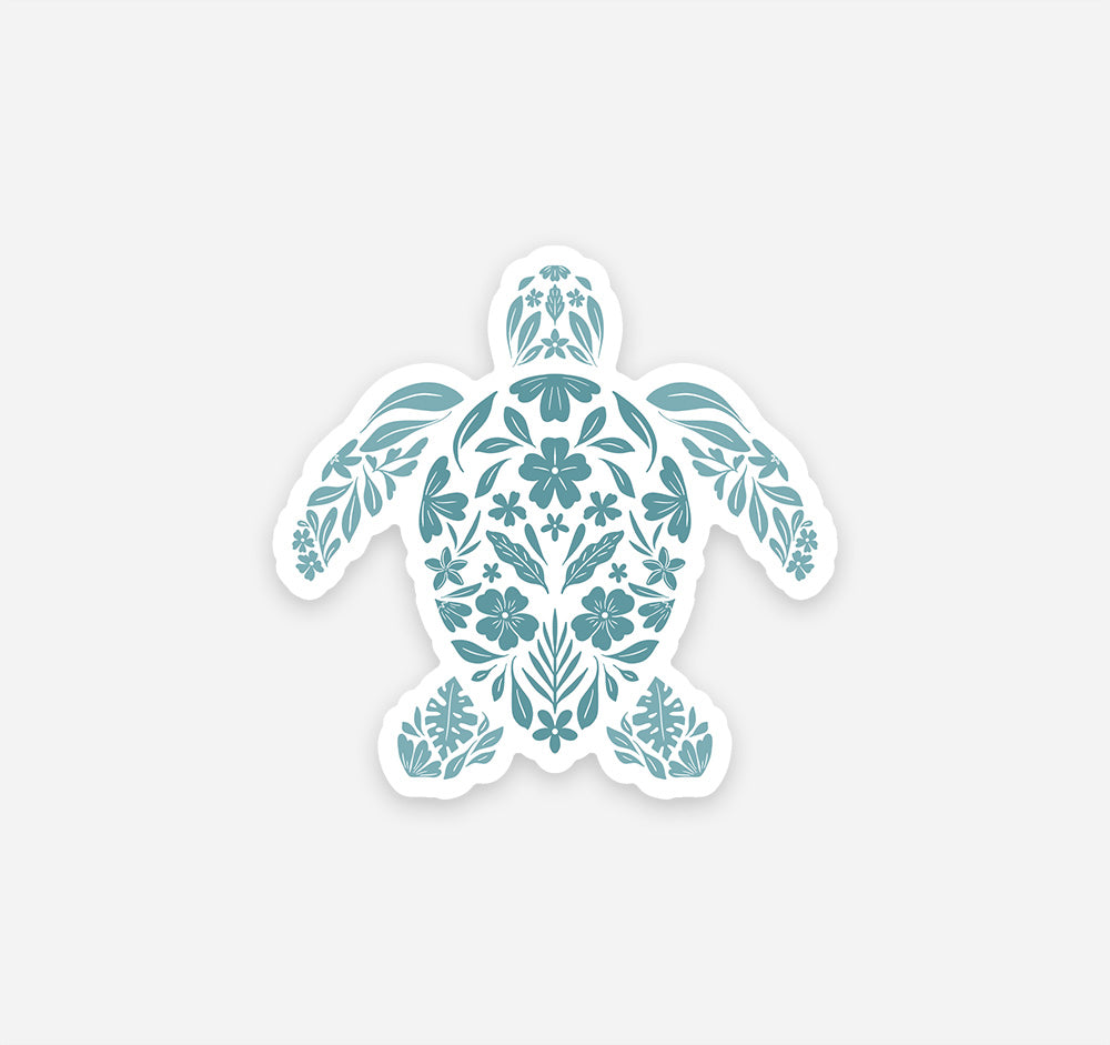 Decorative sea turtle refrigerator magnet designed with pale teal flowers