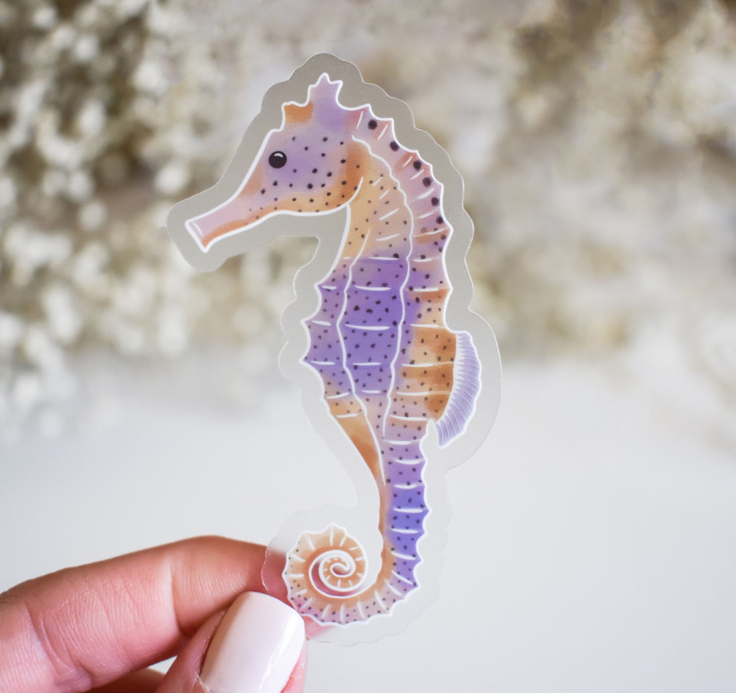 Seahorse sticker in tan, orange, and purple