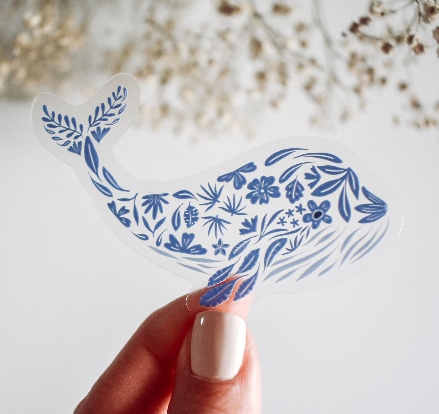 Blue whale sticker designed with floral pattern
