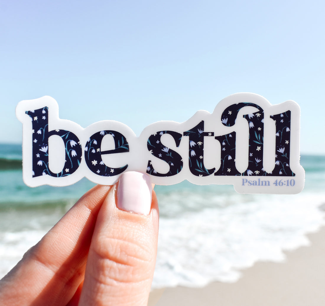 Be still, Psalm 46:10 Bible verse Christian sticker with a floral pattern