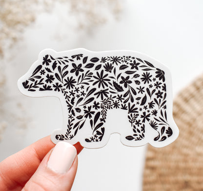 Decorative bear vinyl sticker with black floral patterns