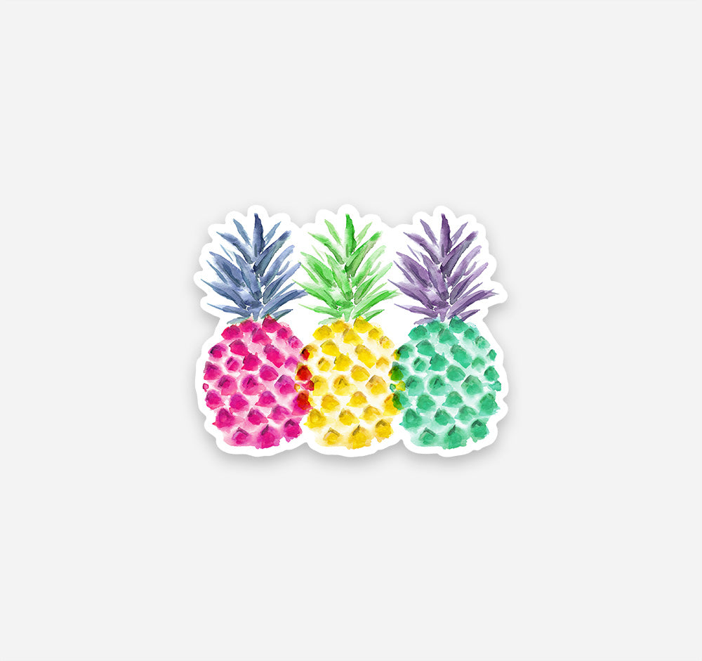 A collection of three colorful pineapples on a vinyl sticker