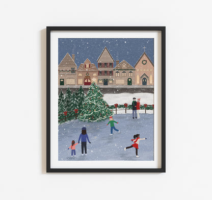 Ice skaters and a Christmas village in the snow art print