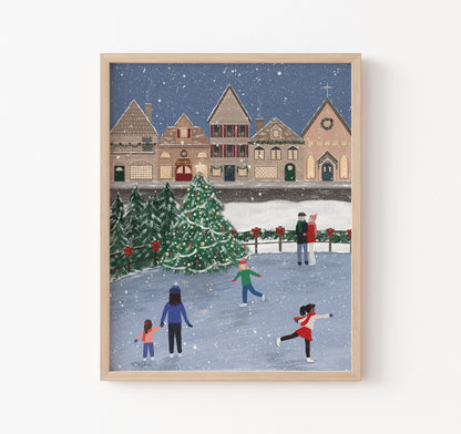 Ice skaters and a Christmas village in the snow art print