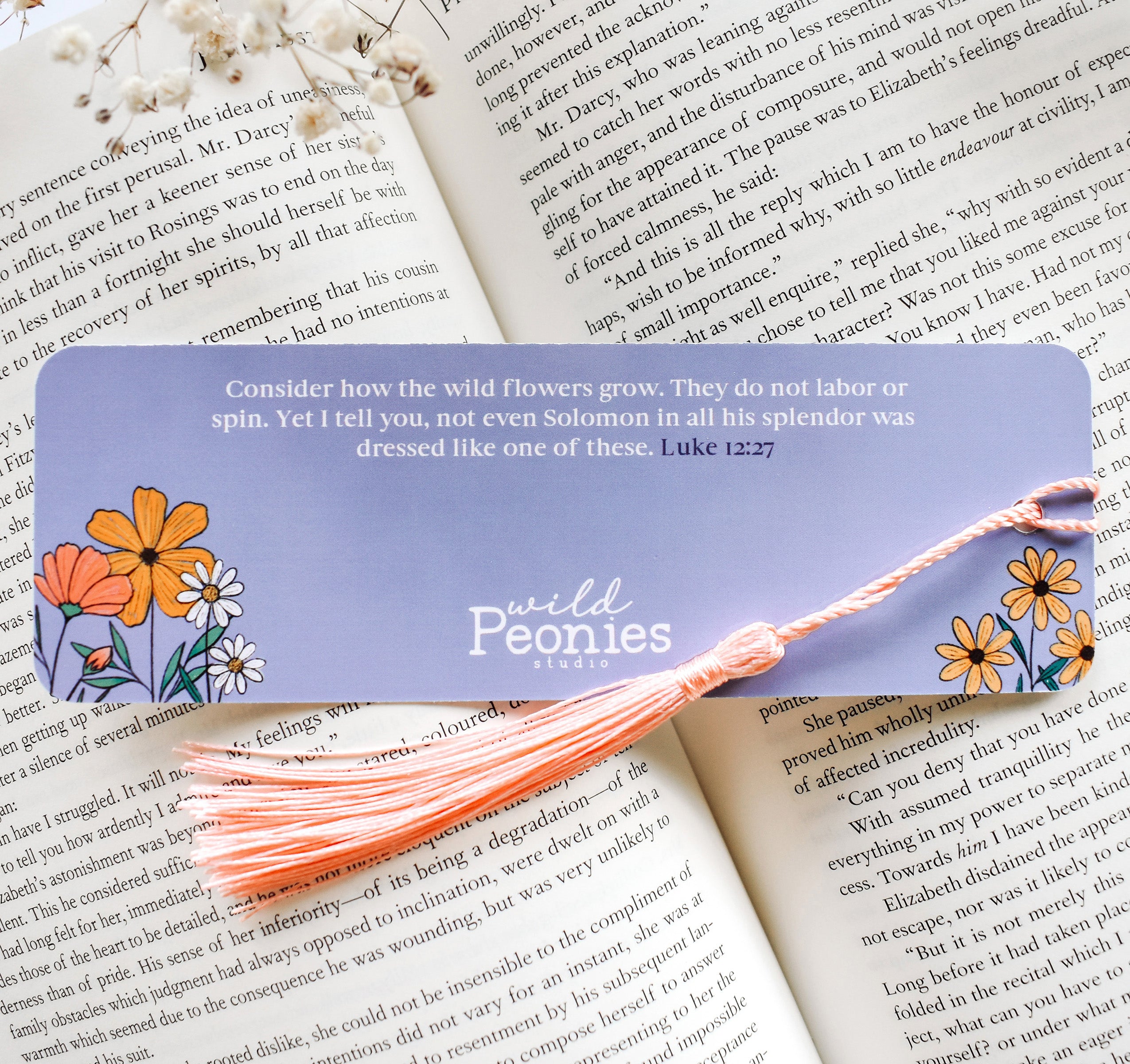 Christian Luke 12:27 Bible verse bookmark with flowers and a pink tassel