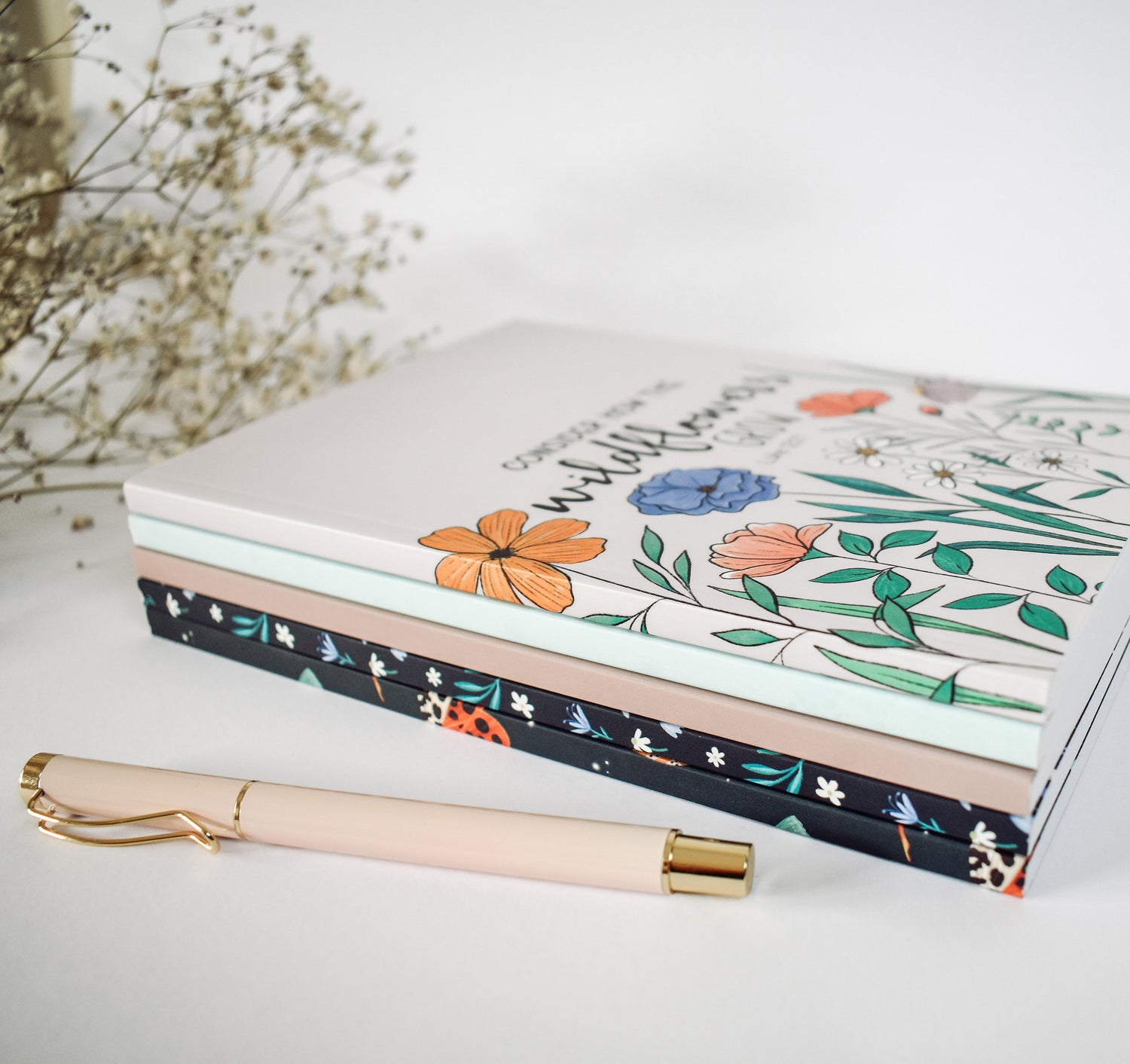 Stack of journals by Wild Peonies Studio