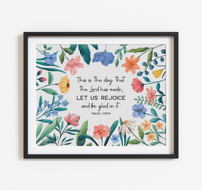 Art print with the Psalm 118:24 Bible verse This is the day that the Lord has made; let us rejoice and be glad in it. This scripture is surrounded by watercolor wildflowers.