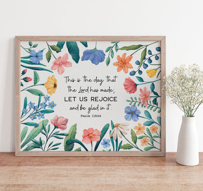 Art print with the Psalm 118:24 Bible verse This is the day that the Lord has made; let us rejoice and be glad in it. This scripture is surrounded by watercolor wildflowers.