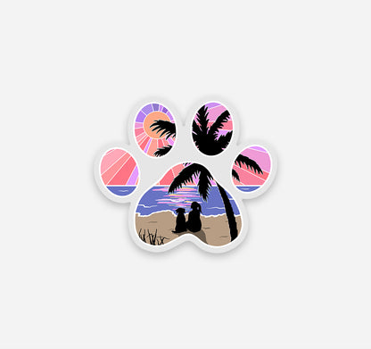 Dog paw print sticker of a girl and her dog watching the sunset at the beach