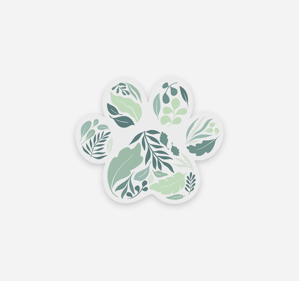 Leaves and nature sticker in the shape of a dog paw print