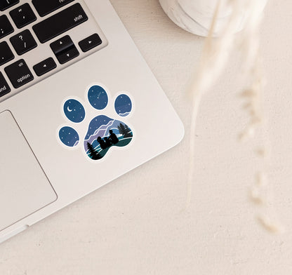 Dog paw print laptop sticker with a couple and their dog looking at the stars