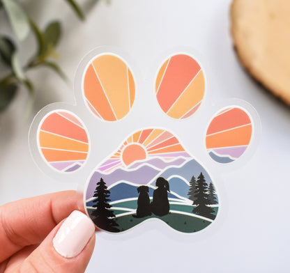 Dog paw print sticker of a girl and dog watching the sunset