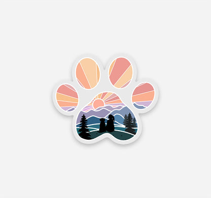 Dog paw print sticker of a girl and dog watching the sunset