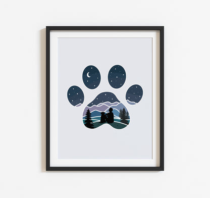 Art print of dog paw print with a man and his dog watching the stars over the mountains