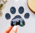 Dog paw print sticker with a guy and his dog looking at the stars and moon