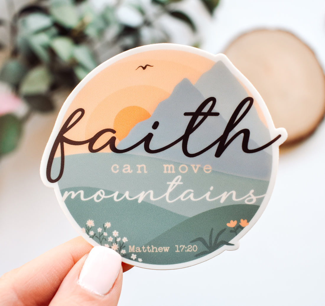 Faith can move mountains, Matthew 17:20 Bible verse Christian sticker with mountains and a sunset