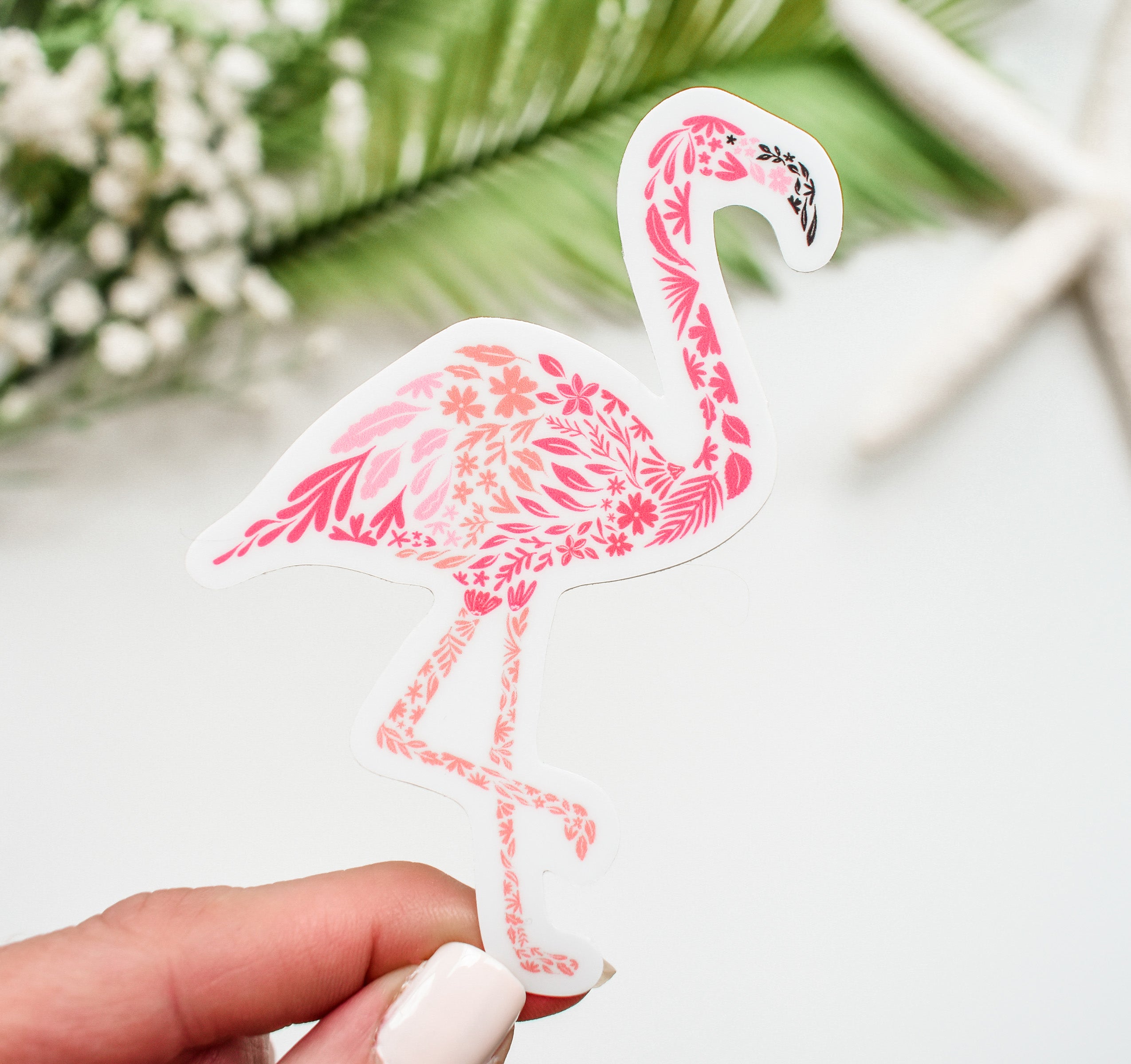 Pink flamingo sticker created from delicate flowers