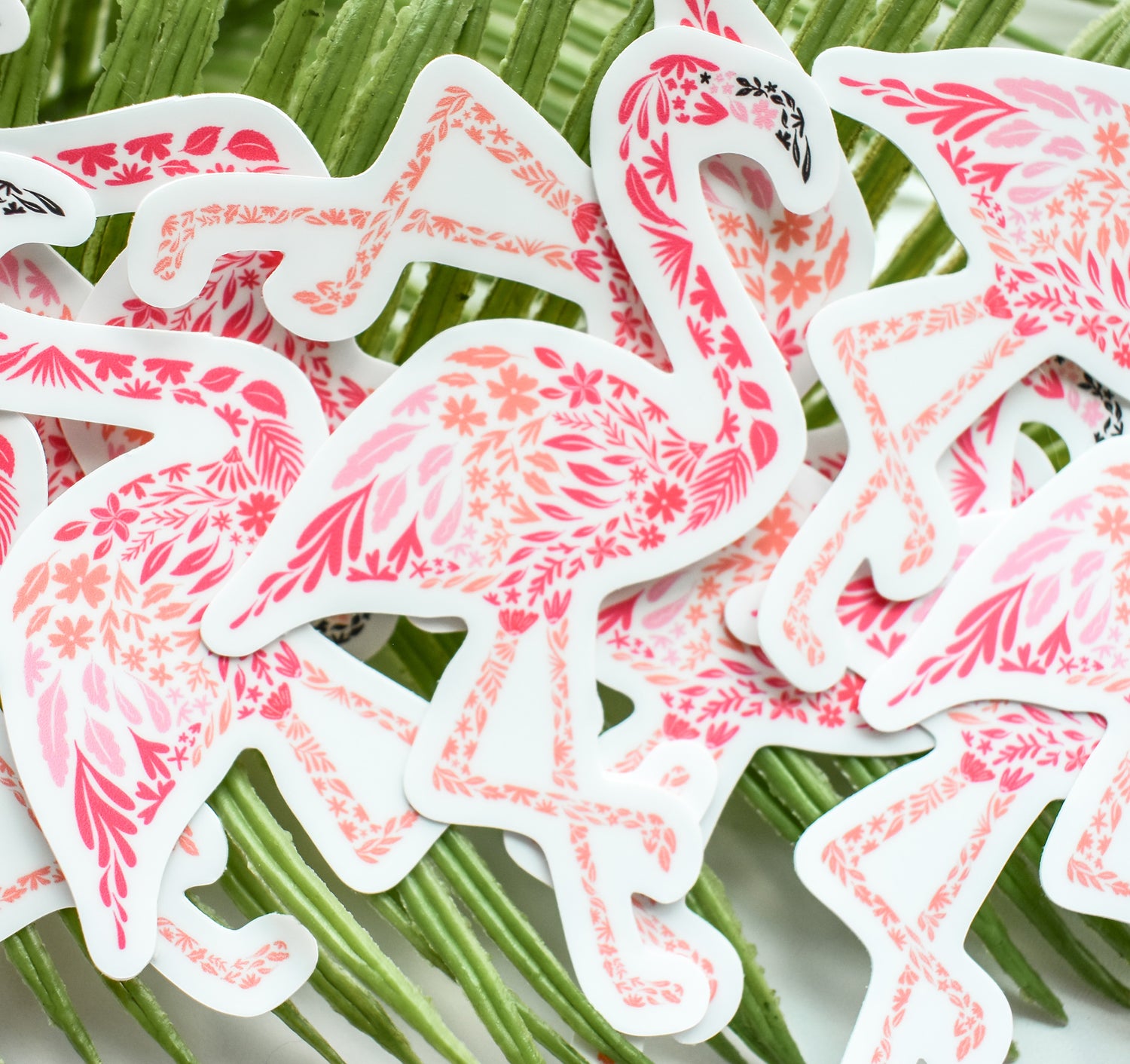 Pink flamingo stickers created from delicate flowers