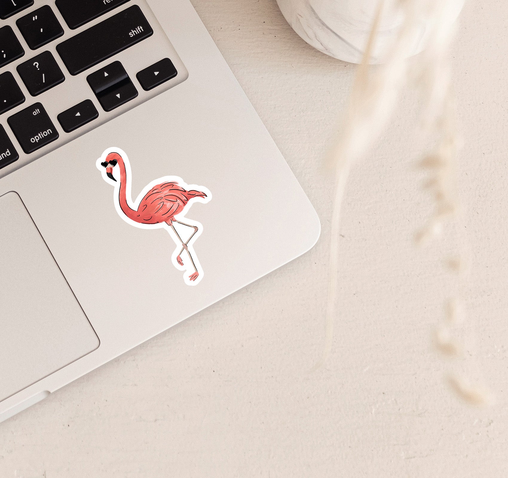 Pink flamingo wearing heart sunglasses laptop sticker