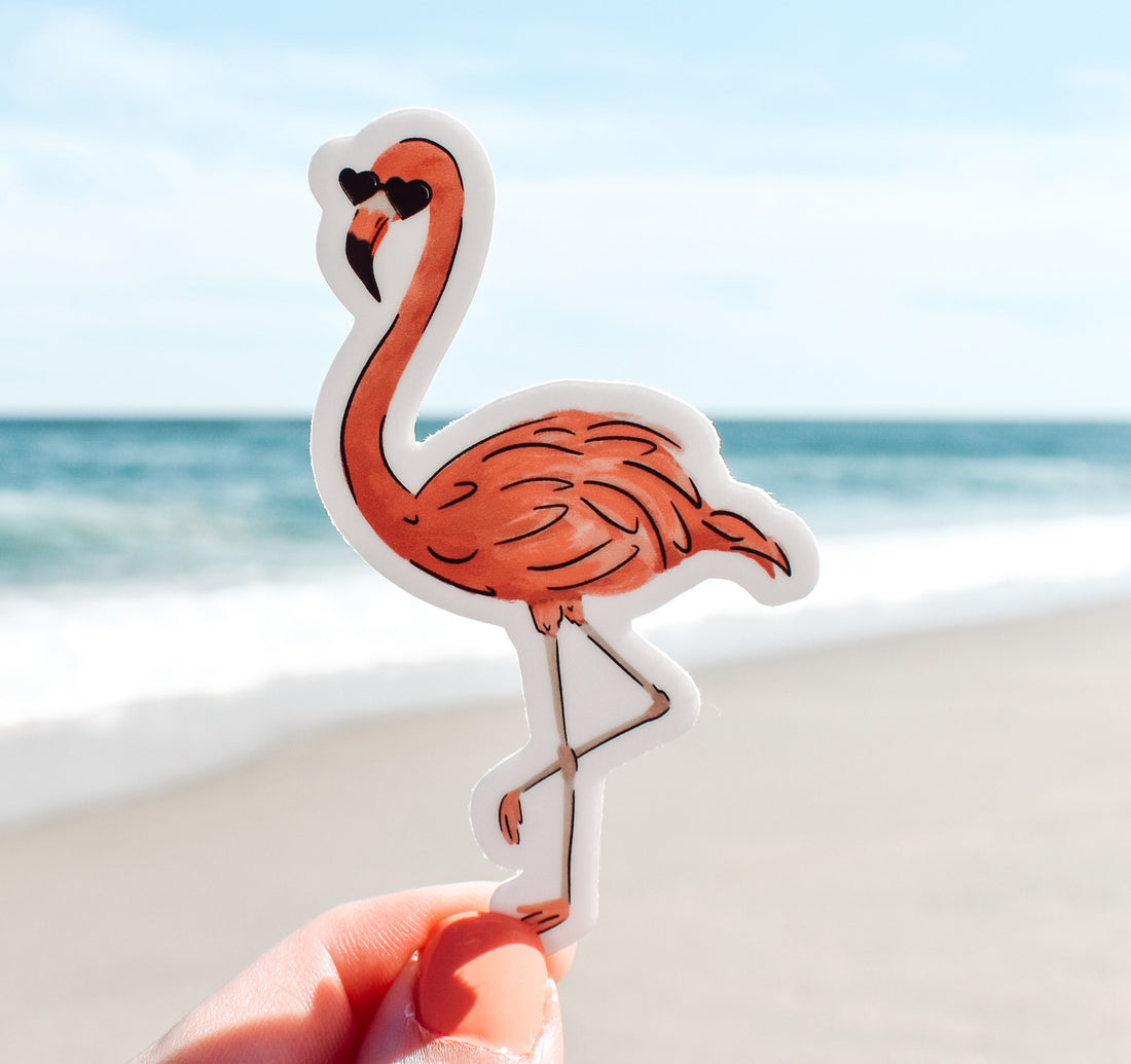 Pink flamingo wearing heart sunglasses sticker
