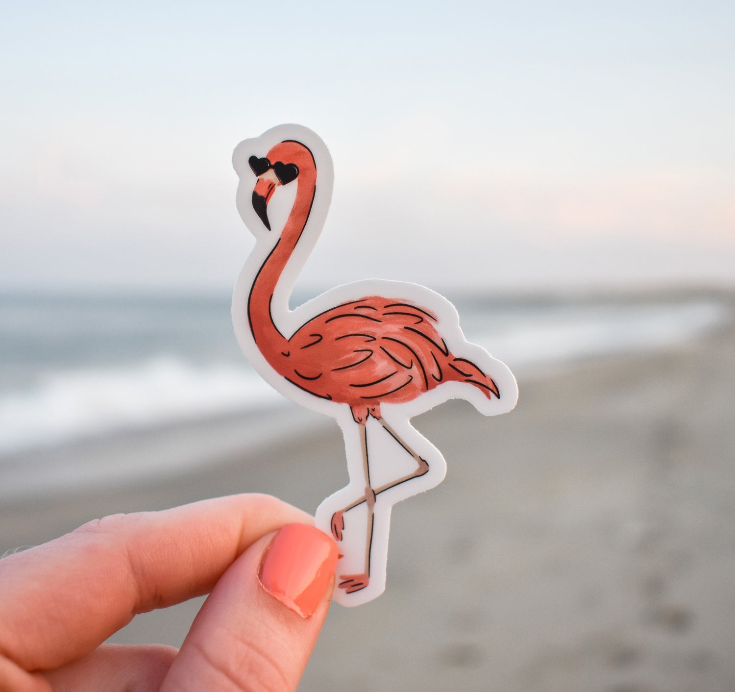 Pink flamingo wearing heart sunglasses sticker