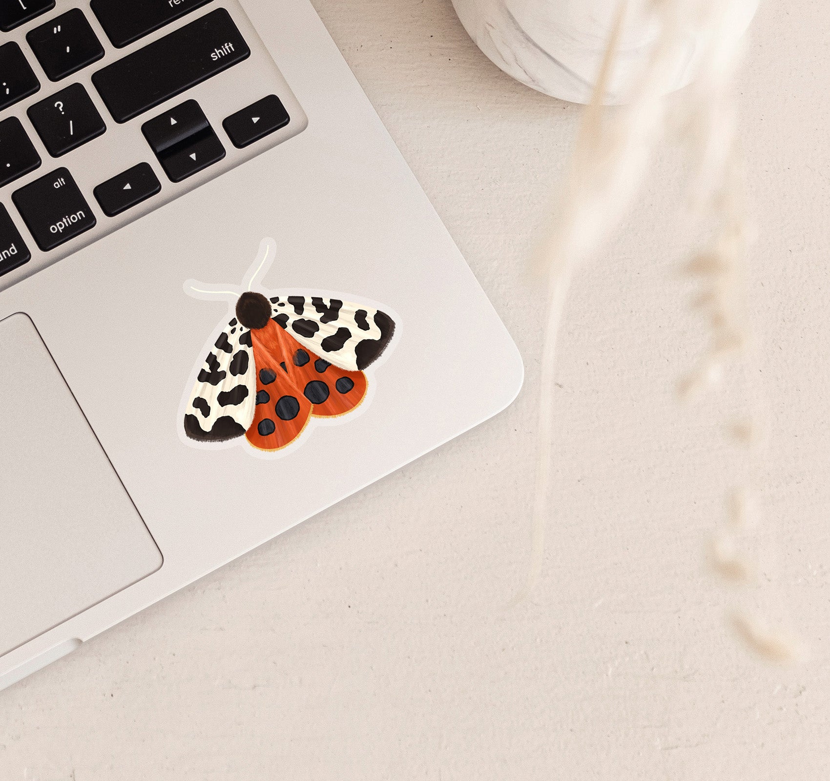 Garden tiger moth laptop sticker