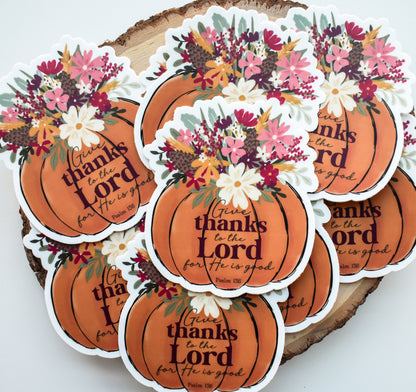A set of die-cut sticker decals shaped like orange pumpkins, decorated with autumn floral bouquets and the printed message &