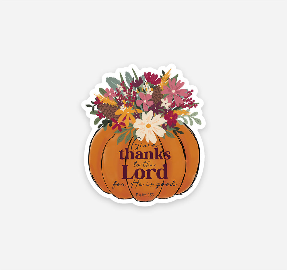A die-cut sticker featuring an orange pumpkin with the words &
