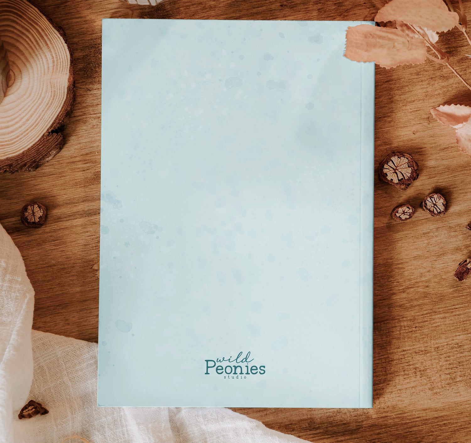 Back cover of a sea turtle journal in pale turquoise