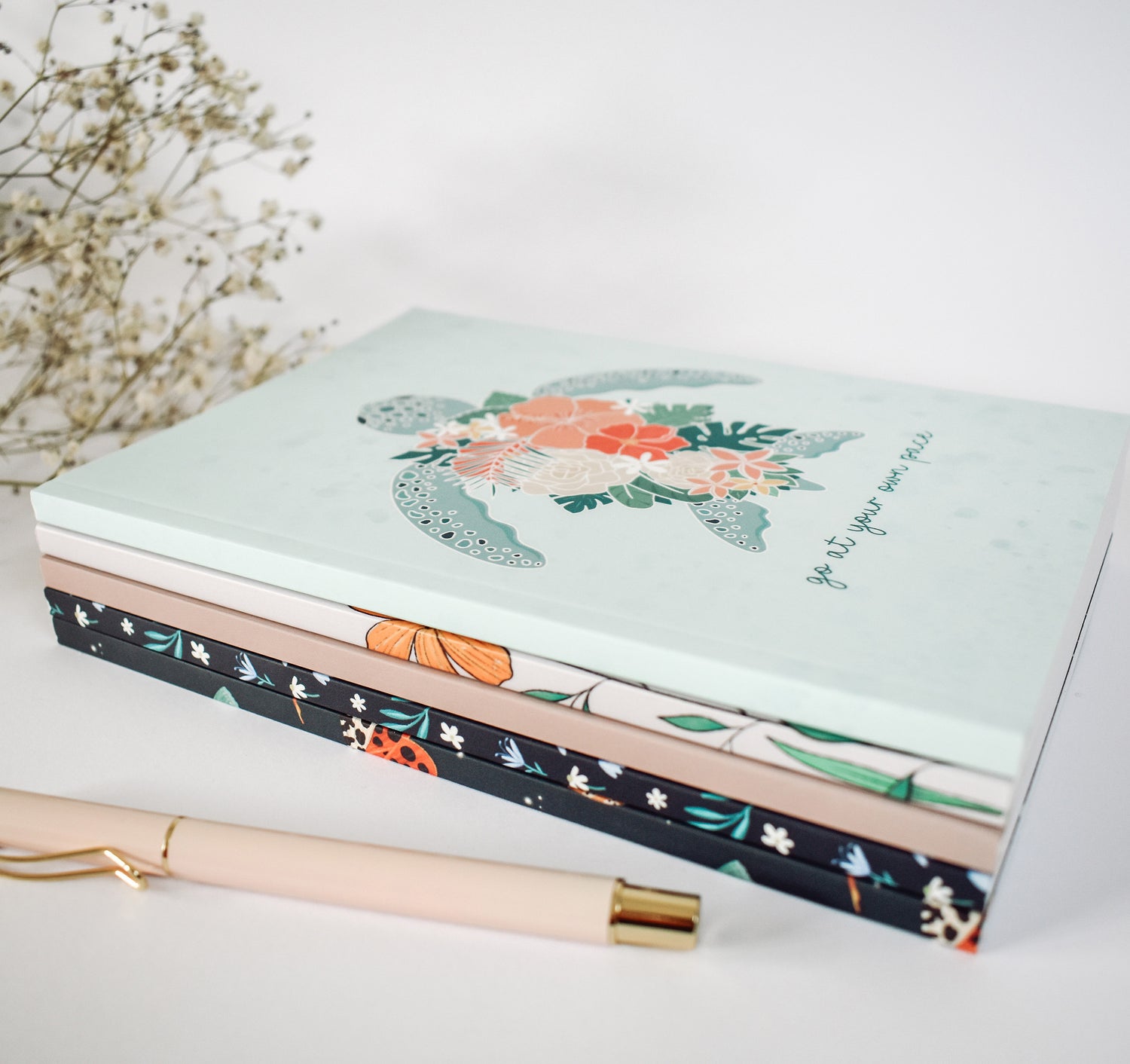 Stack of notebooks by Wild Peonies Studio