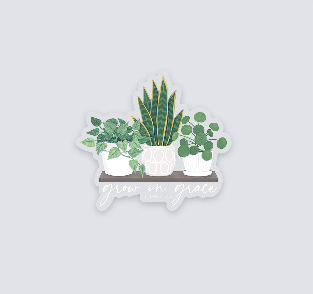 Grow in grace, 2 Peter 3:18 Bible verse Christian sticker with a shelf of houseplants. These plants include a pothos plant, snake plant, and pilea peperomioides