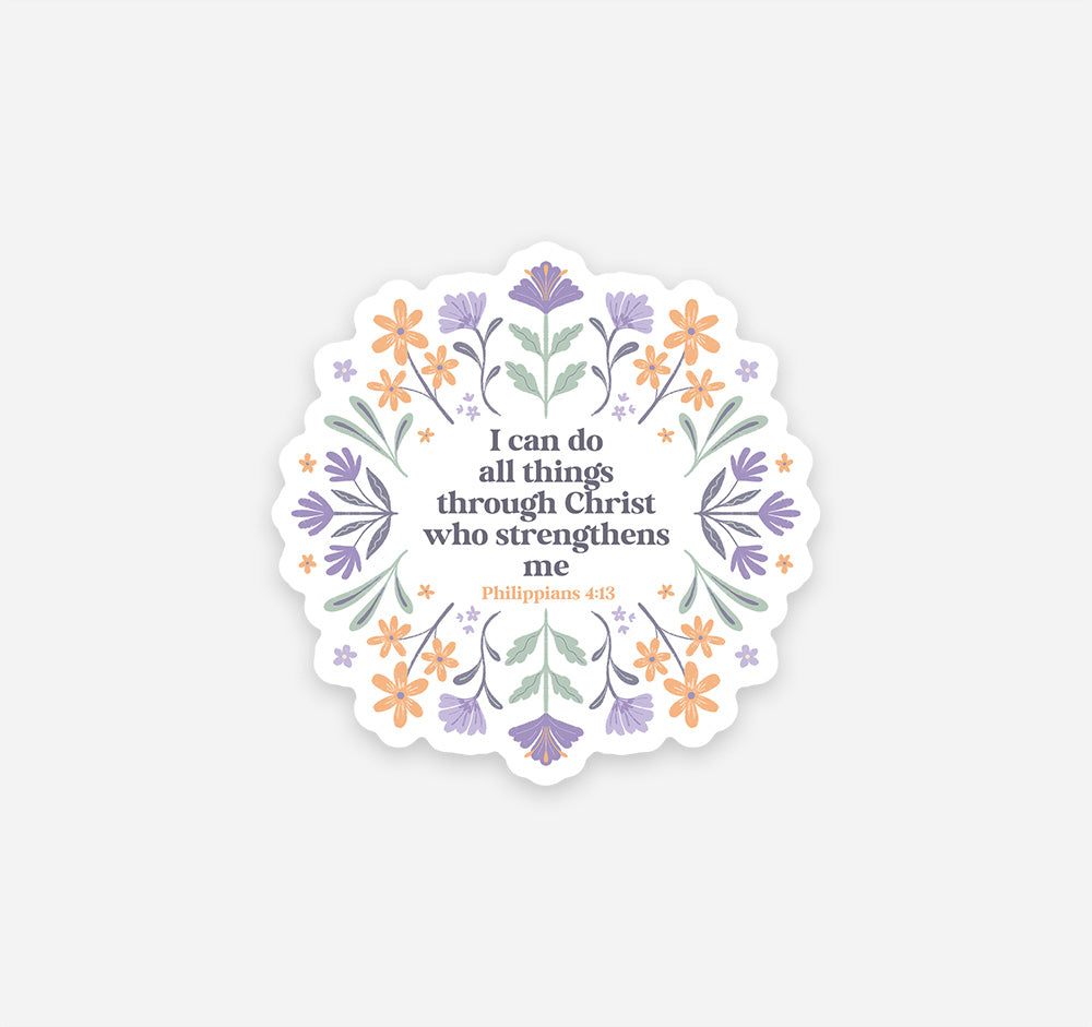Decorative Christian faith sticker with the Bible verse "I can do all things through Christ who strengthens me, Philippians 4:13" surrounded by hand-drawn purple and orange flowers.