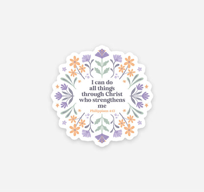 Decorative Christian faith sticker with the Bible verse "I can do all things through Christ who strengthens me, Philippians 4:13" surrounded by hand-drawn purple and orange flowers.