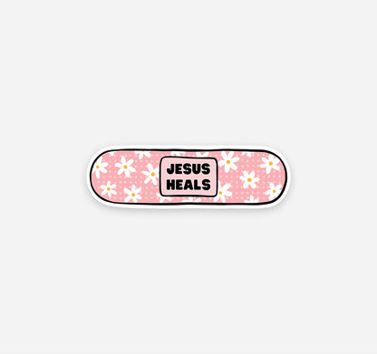 Jesus heals vinyl sticker on a band aid design