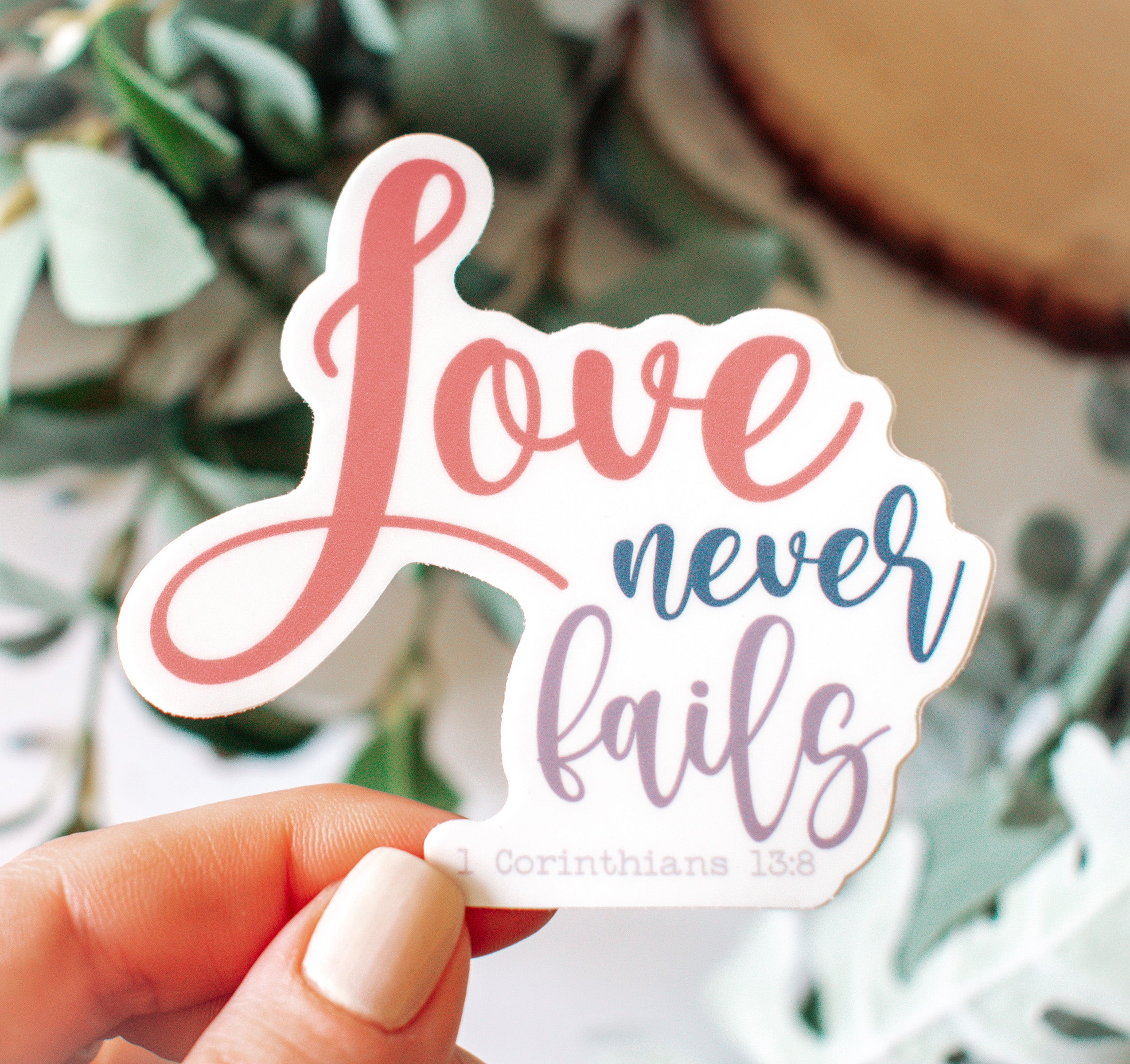 Love never fails, 1 Corinthians 13:8 Bible verse Christian sticker