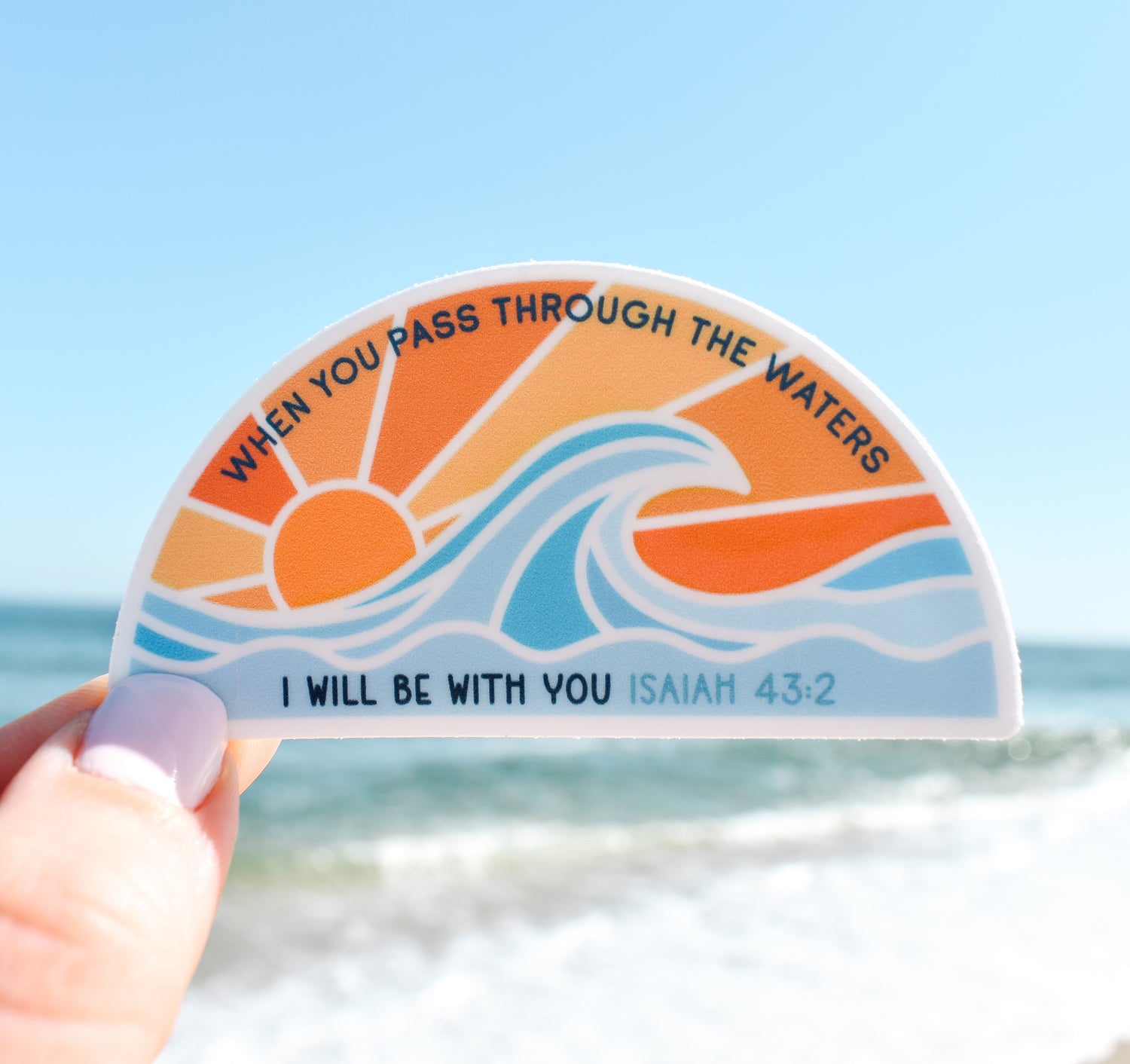 When You Pass Through The Waters, Isaiah 43:2 Bible verse sticker with an ocean wave at sunset