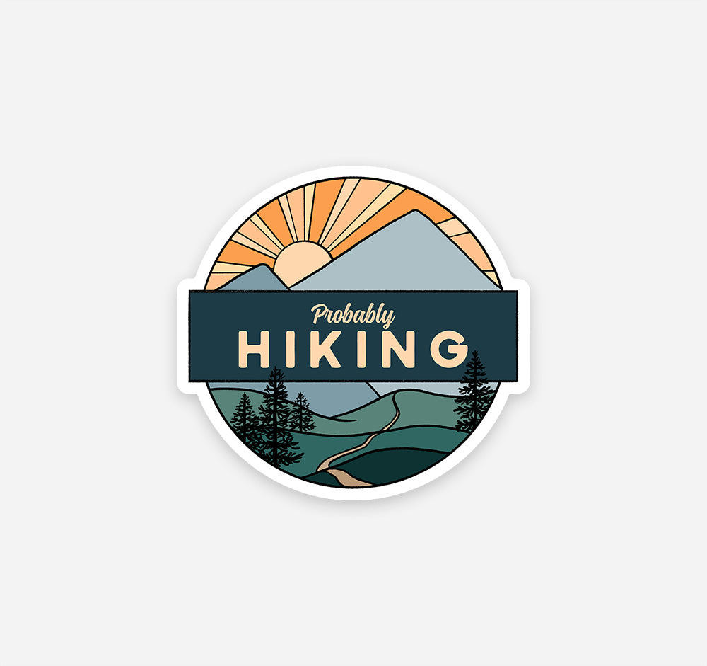 Mountain sticker with a trail, pine trees, and a sunset with the phrase &quot;probably hiking&quot;