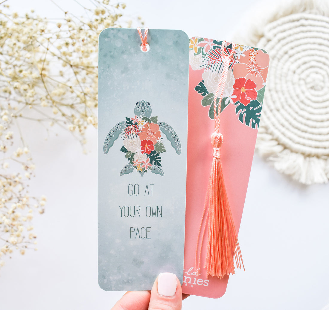 Hawaiian green sea turtle with tropical flowers bookmark and the quote &quot;go at your own pace&quot;