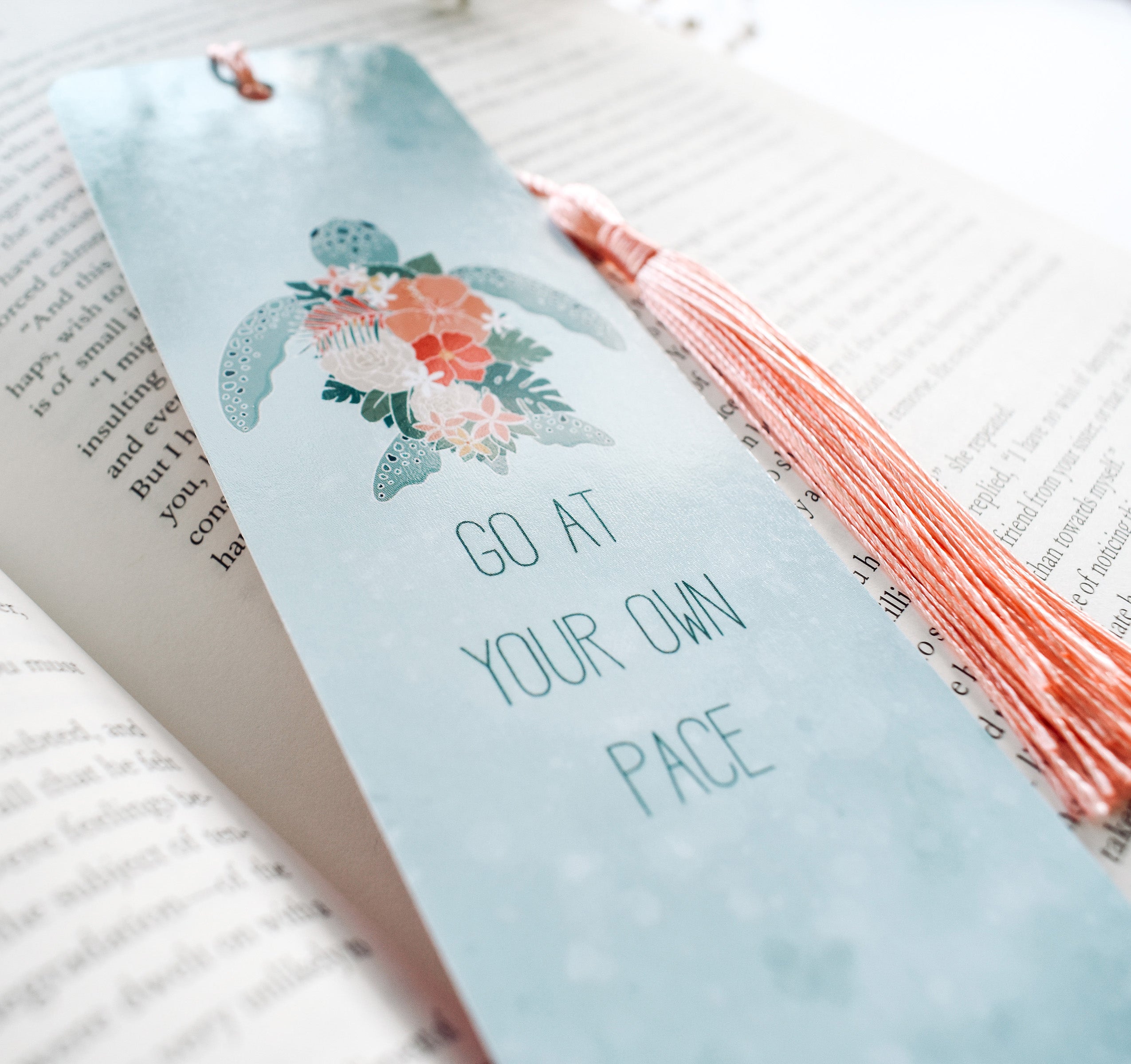 Hawaiian green sea turtle with tropical flowers bookmark and the quote &quot;go at your own pace&quot;