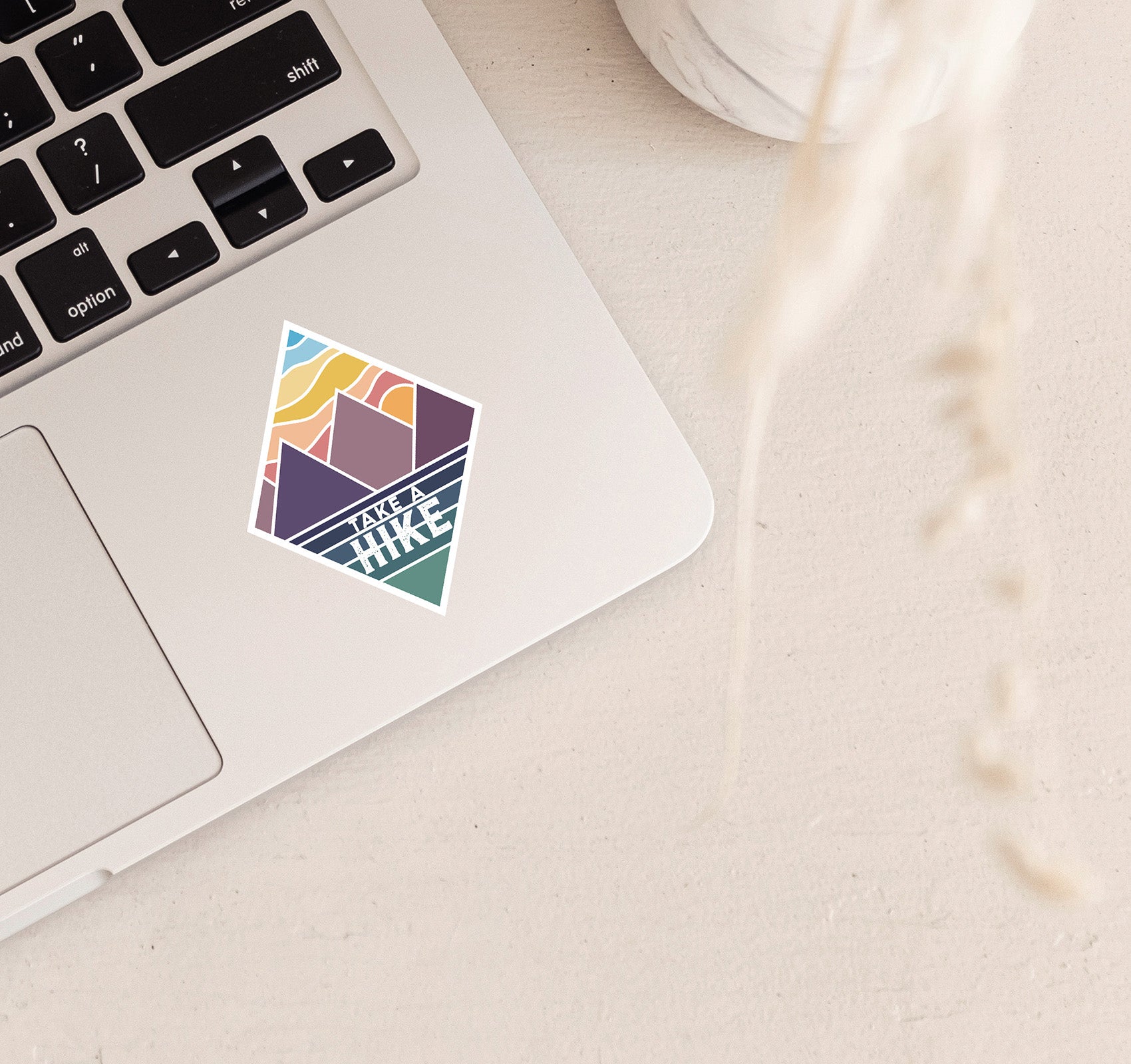 Take a hike laptop sticker with mountains at sunset